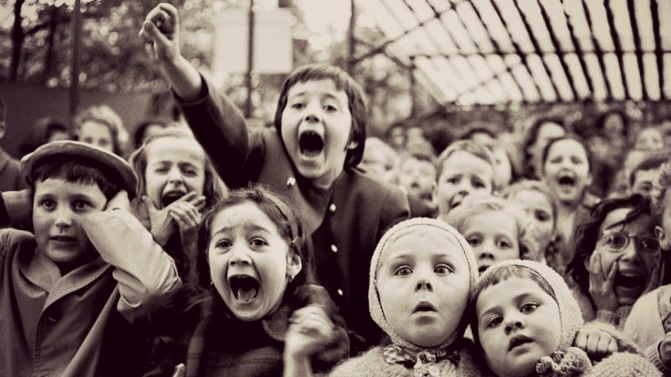 Eisenstaedt Children at Puppet Theatre Children Watching the Story of “Saint George and the Dragon” at the Puppet Theater in the Tuileries, Paris, 1963