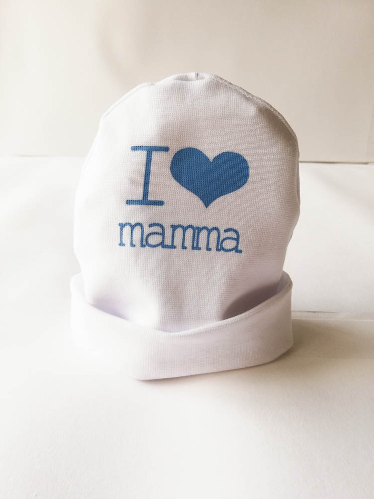 Cappellino neonato in cotone elasticizzato con scritta I ❤️ Mamma. Col.Bianco. C066