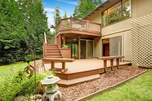 A deck built for entertaining, this multi-level design will quickly become a favorite gathering spot for after-work relaxing and weekend barbecues. Built-in bench seating, an elevated patio and a screened-in sun porch make this unique deck the showpiece o