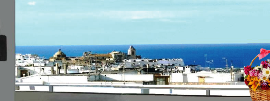 Vista panoramica a Nord-Est della casa in vendita: Cattedrale di Ostuni e mare all'orizzonte.