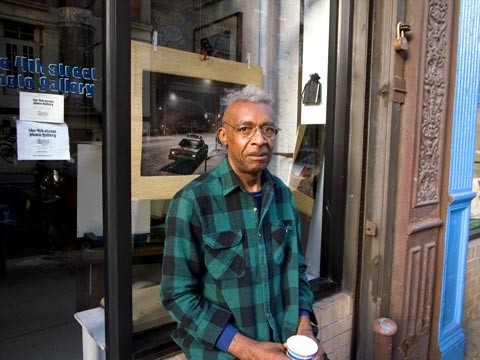 ALEX HARSLEY IN FRONT OFTHE  4TH ST PHOTOGALLERY