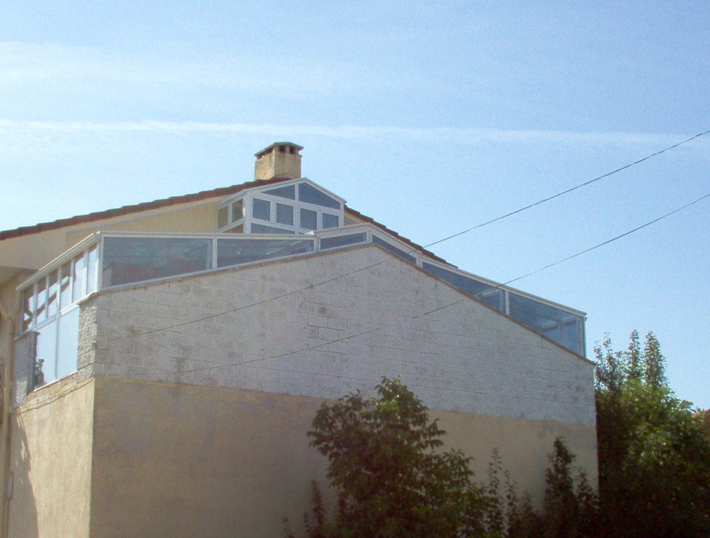 Cerramiento con techo de cristal y rotura de puente térmico