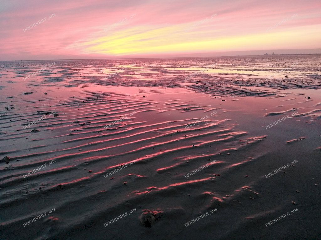 besonders eindrucksvoller Sonnenuntergang im Watt