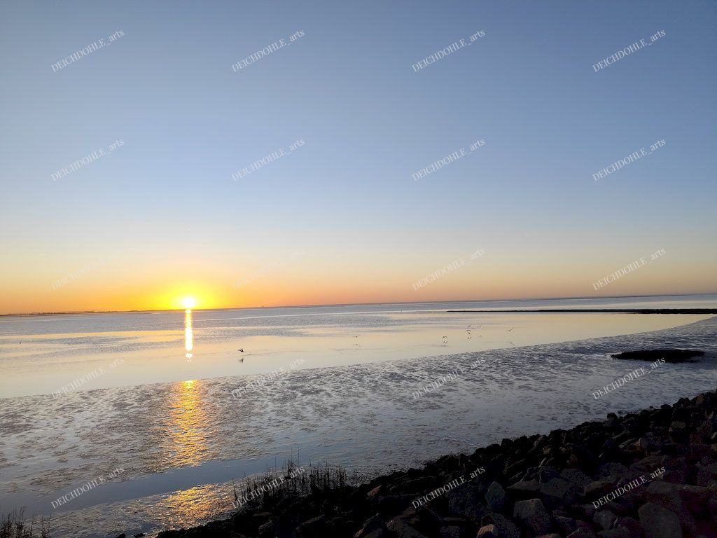 Sonnenuntergang an der Nordsee in der Meldorfer Bucht