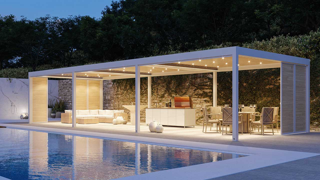 Moderne Lamellendach Pergola am Pool mit schöner Couch und großzügigem Essbereich und einer Gartenküche für schöne Stunden am Abend.