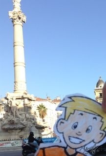 Flat Stanley poses at the Castellane monument in the 6ème quartier of Marseille