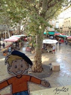 Flat Stanley overlooking the produce market on Place Richèlme from the ICCP office window, Aix-en-Provence, France