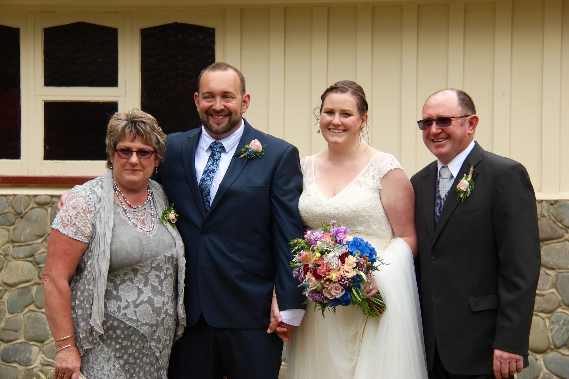 Mum and Dad with the happy couple. Mum looking gorgeous!