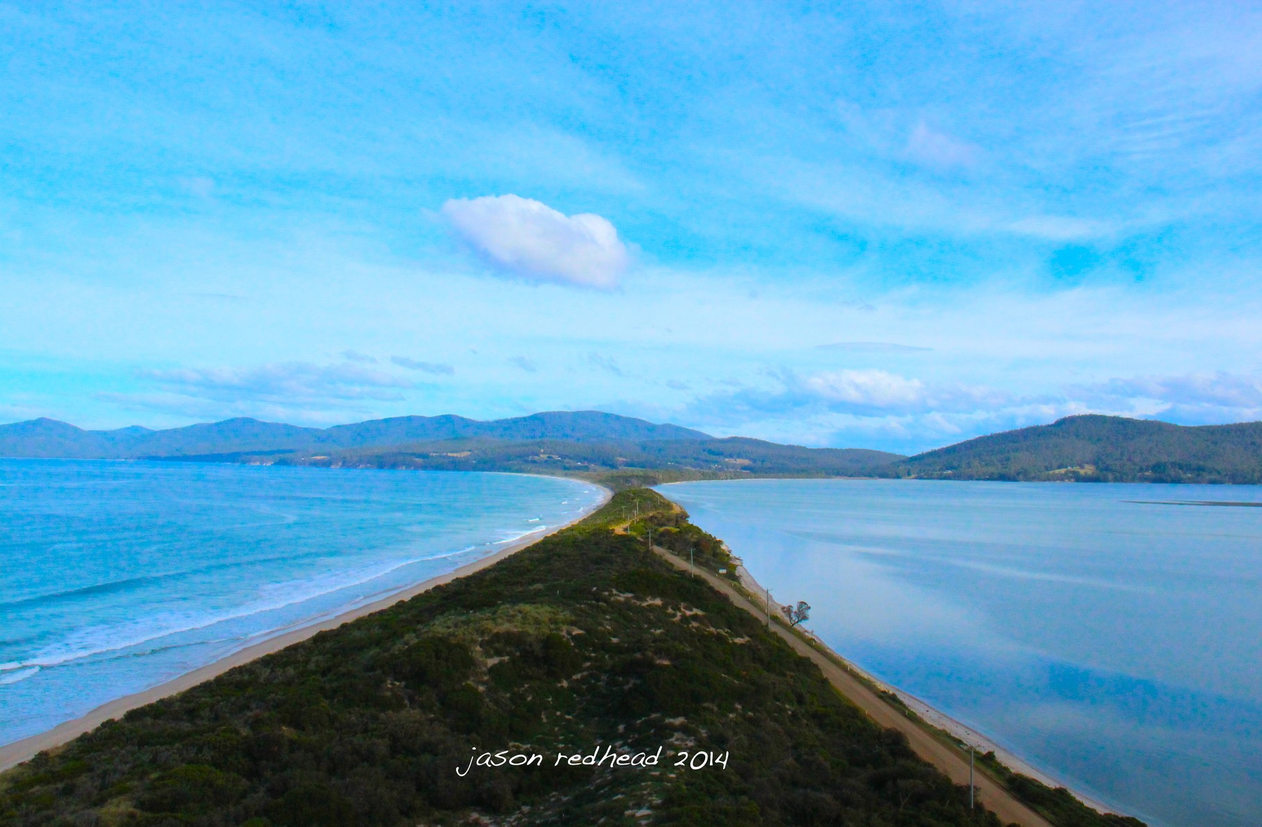  18-05-14 dot the i and cross the t; after a hundred step stair case we were greeted with this stunning view. surf on one side and water ski on the other. neck beach, south bruny, tasmania 