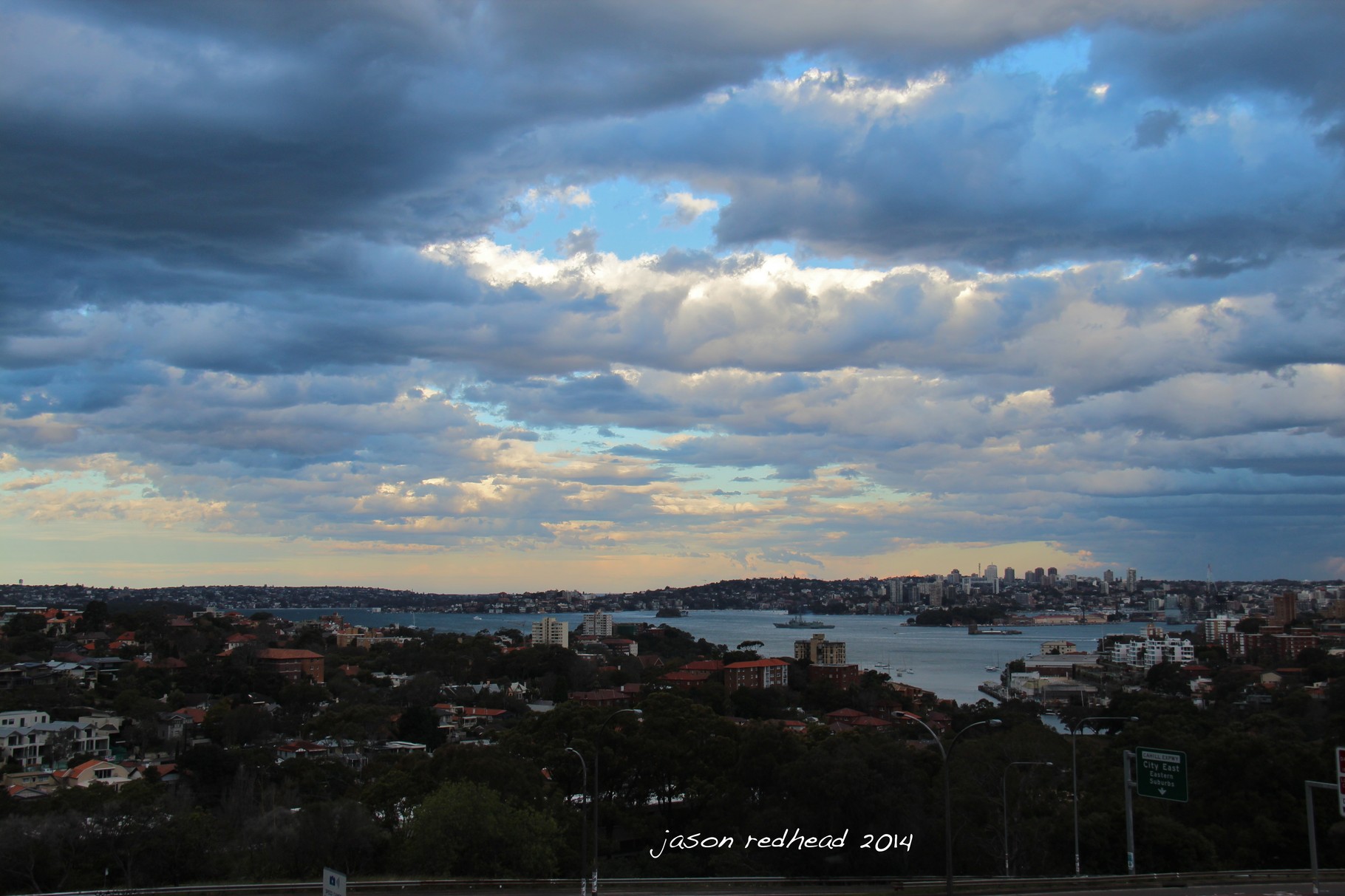  28-06-14 ideal vantage point; after driving under this empty walk bridge a thousand times i finally walked across it and captured it's prime realestate. gotta love sydney on days like this, kirribilli, nsw 