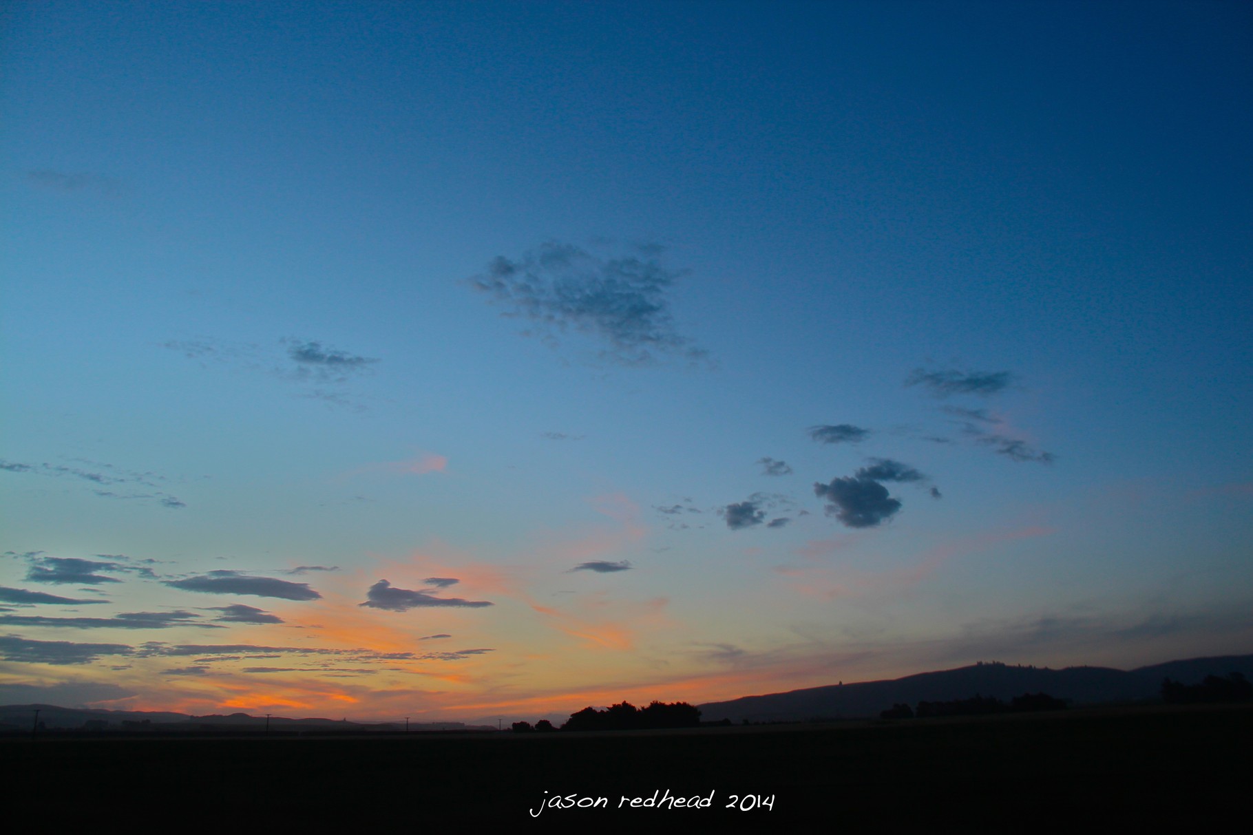  24-12-14 welcome home; so good to be back home on aotearoa, what a better welcome that this stunning sunset as we drive south to celebrate christmas with the family, orari, new zealand