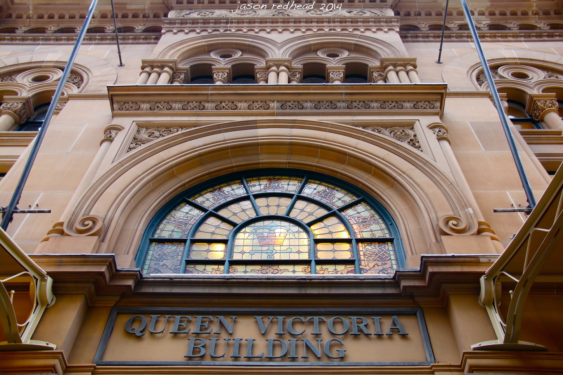  19-10-14 pulling faces at the queen; not sure if the queen would be very impressed at this rude face this building is pulling at her? qvb, nsw
