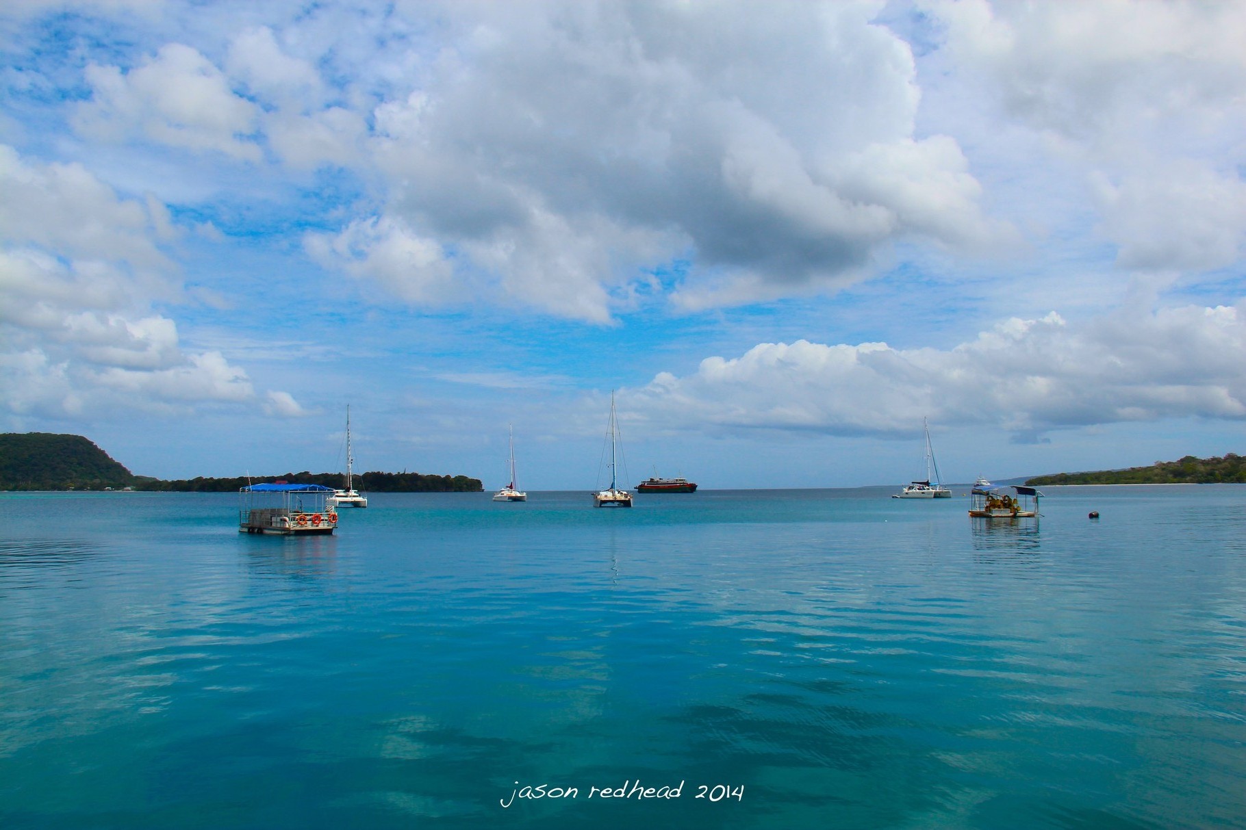  02-09-14 colours of the rainbow; what more could you ask for - blue water, blue sky, a few white clouds and stunning weather and lots of coloured fish to swim with, vila bay, efaté, vanuatu