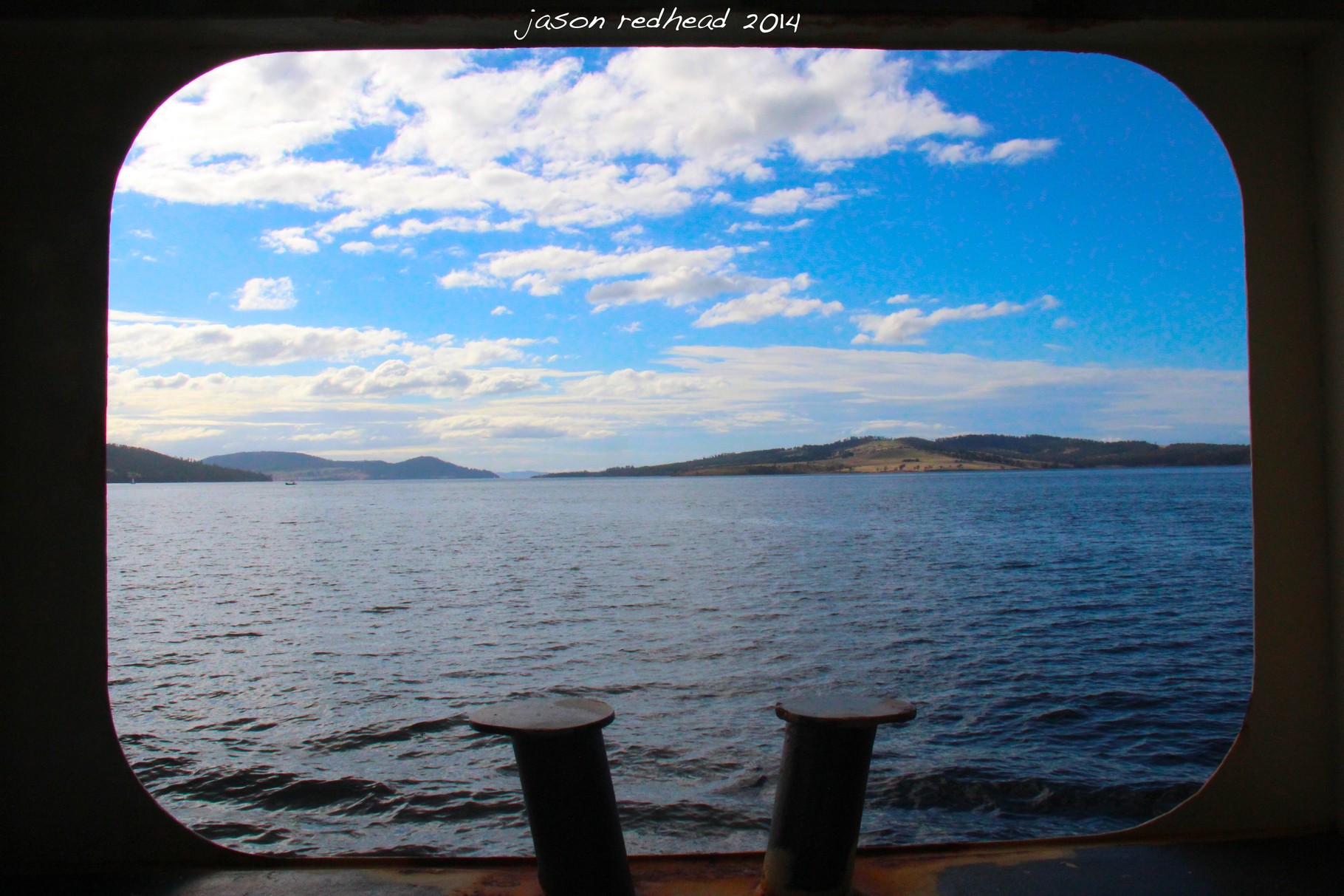  17-05-14 port hole vision; what a stunning way to travel, a car ferry across the bay, north west bay, tasmania 