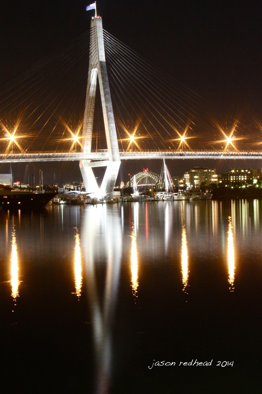  24-04-14 twenty eight percent; two of the seven bridges including the anzac all lit up as we remember, bicentennial park glebe, nsw 
