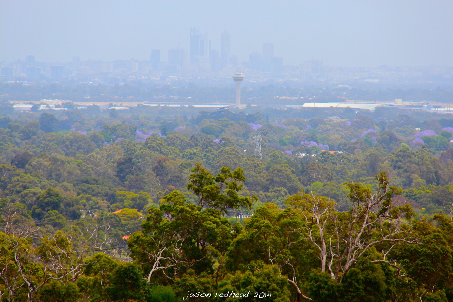  10-11-14 he bush and the city hanging out; after getting bored with the highways and freeways we found this stunning little out look. somewhere out there, there is a city called perth, gooseberry hill, nsw
