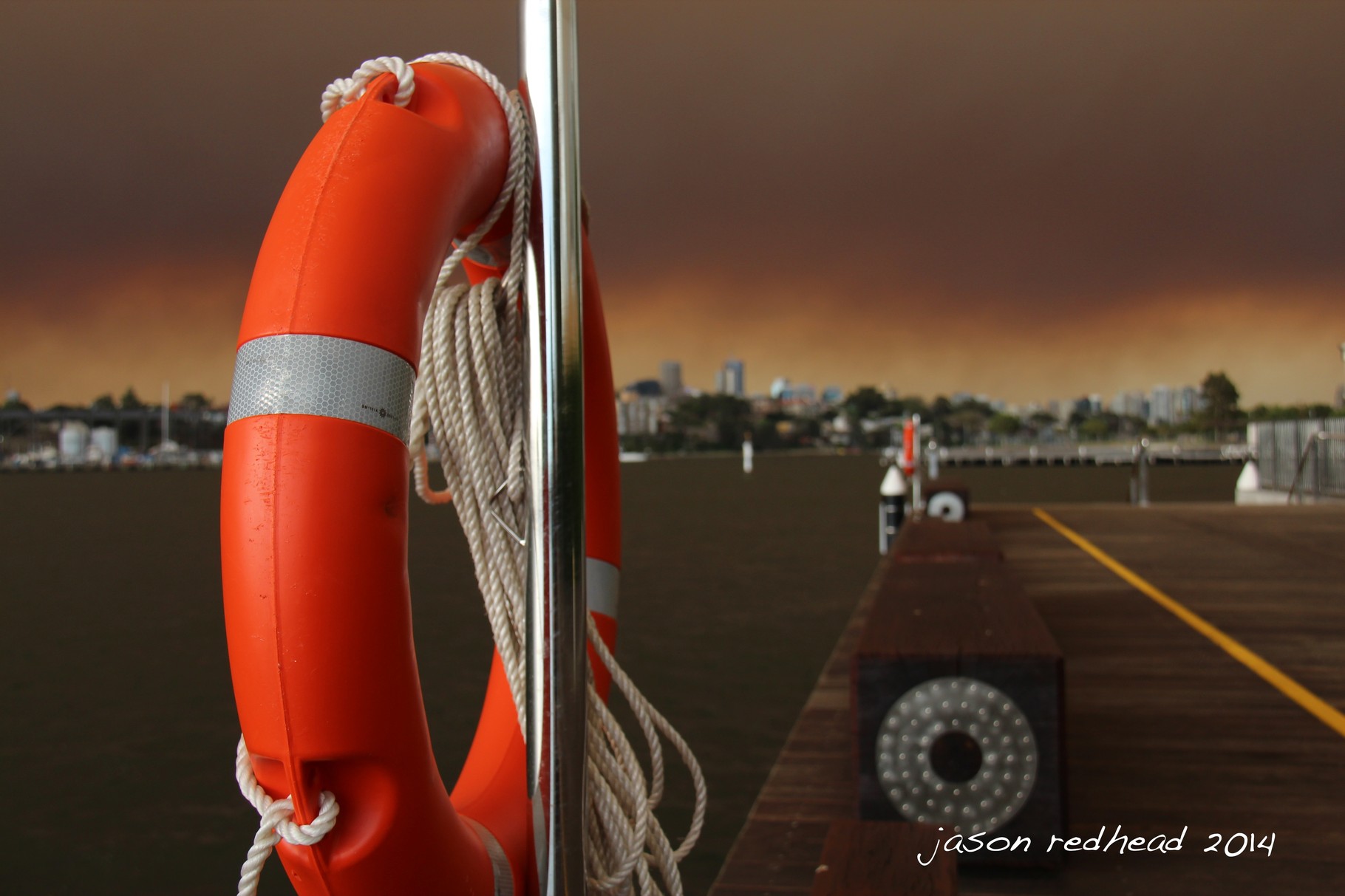  01-01-14 stormy and firey sydney; the view from home after the smoke from the bush fires flowed through sydney creating such an amazing effect in the sky, pyrmont, nsw 