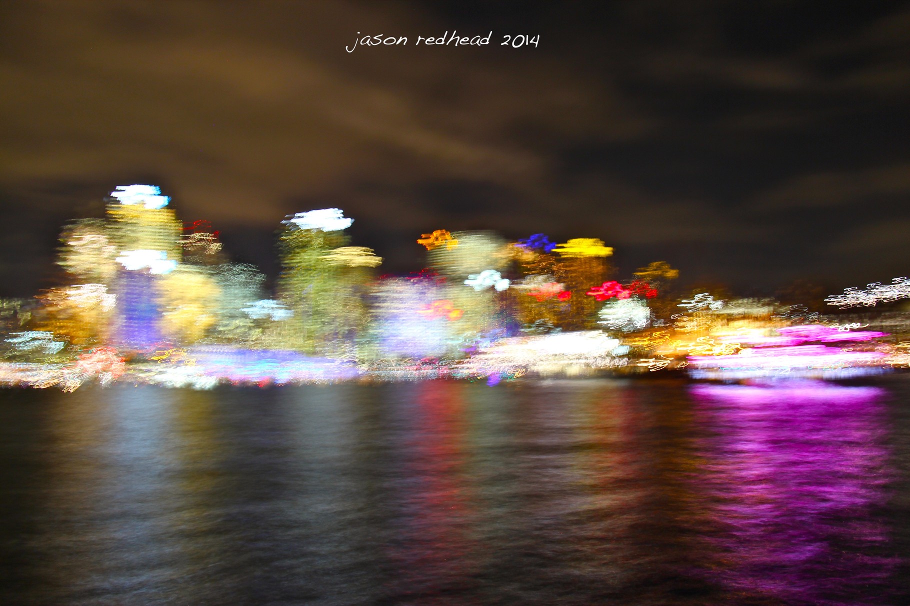  05-06-14  a-teeeen-shun!; hats on and standing tall, sydney cbd lights up and stands at attention. it just needs a hand so it can salute me. sydney harbour, nsw 
