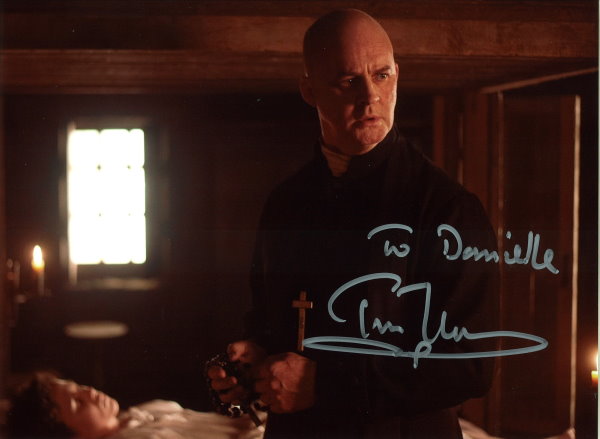 Tim McInnerny as Father Bain 