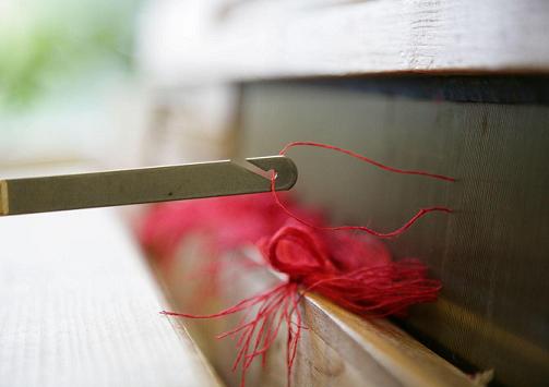 Kettfaden ins Blatt stechen