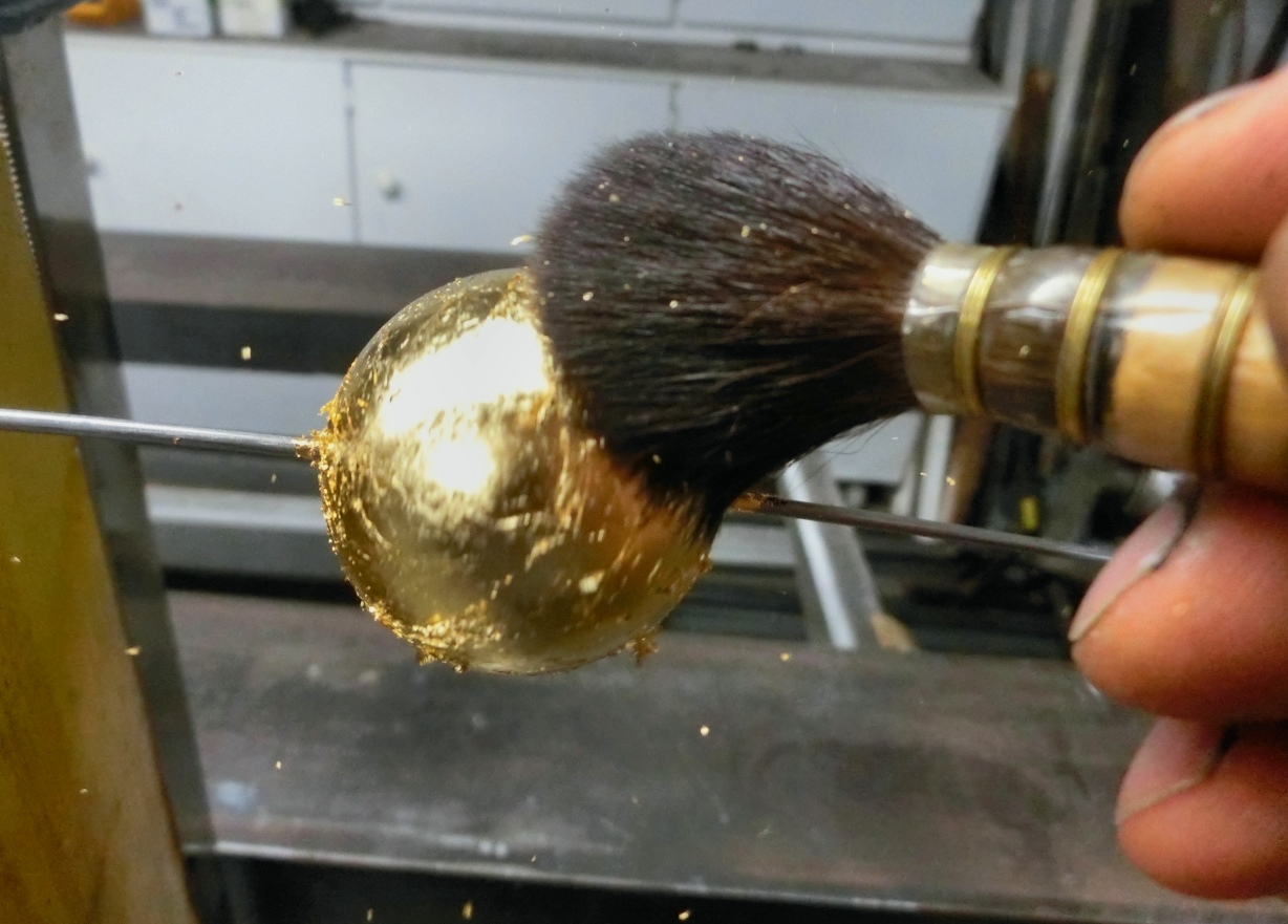 Pose de feuille d'or 24 carats