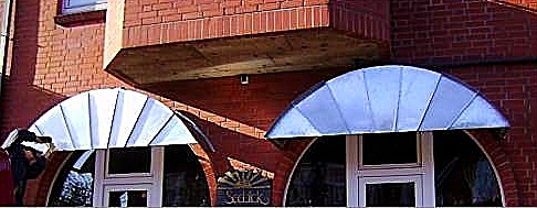 Schaufenster Überdachungen in Zink
