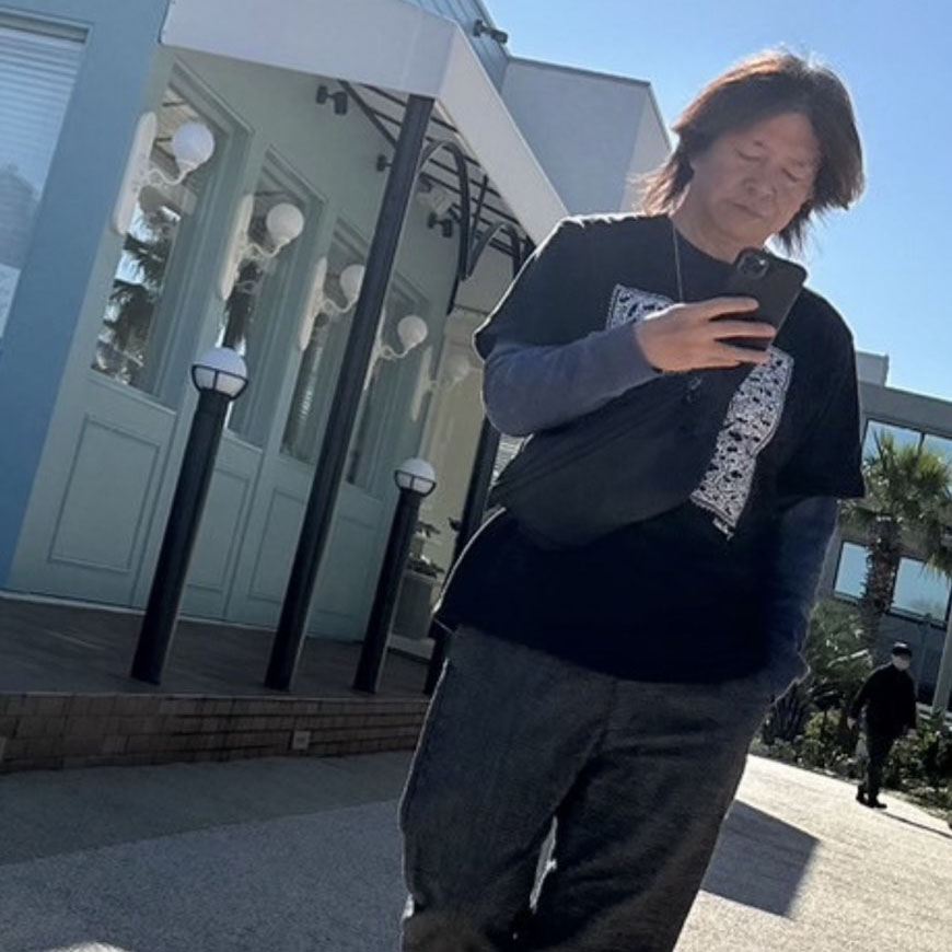 井関謙治