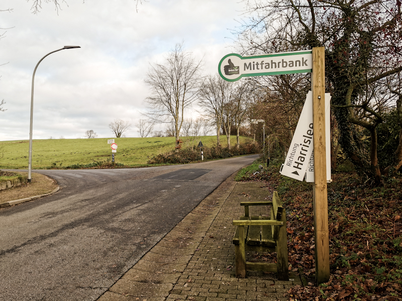 The hitchhiking-bench including signs, where to hitch. Such a fantastic idea! 