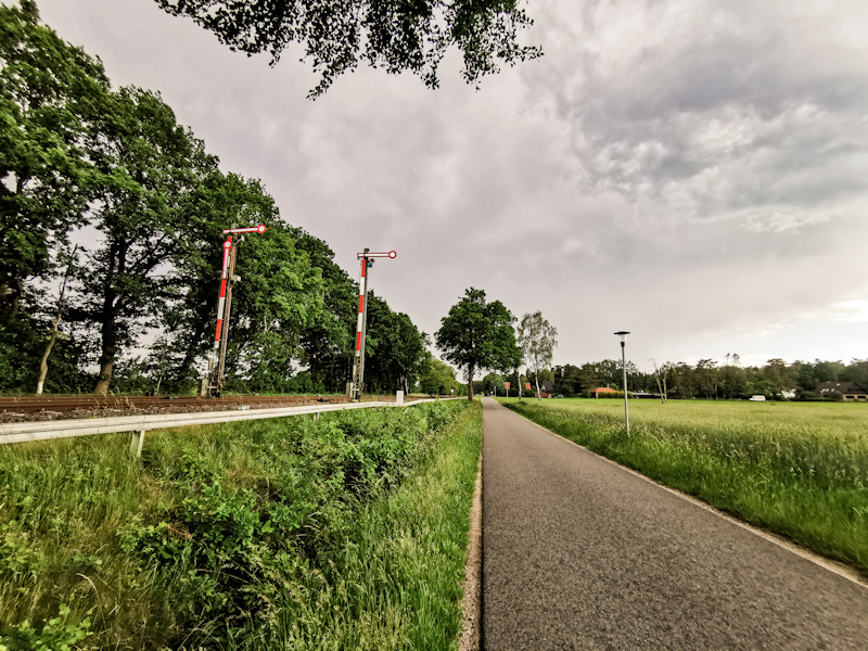 Getting close to my destination, with dark clouds looming ahead of me. And cool signal. A reminder of my Märklin model railway. 