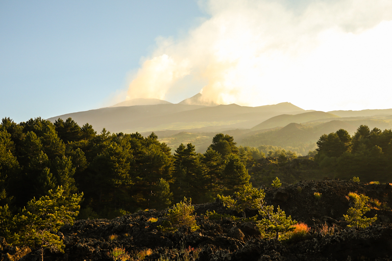 One last look back before the peak is fully engulfed by clouds