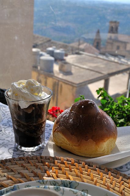 Premium Photo  Traditional sicilian granita coffee flavor with brioche  close up