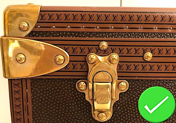 Fermoir en laiton poli Magasin louis vuitton