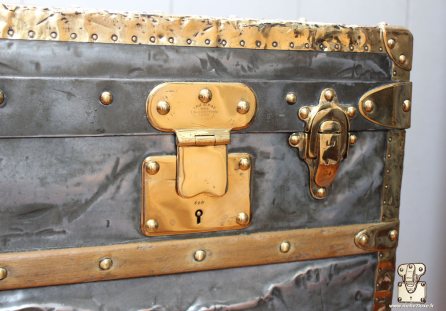 reparer serrure louis vuitton laiton