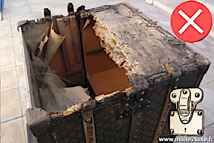 archive photo malle de luxe Louis vuitton pourri