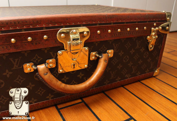 A RED EPI LEATHER ALZER 65 HARDSIDED SUITCASE, LOUIS VUITTON