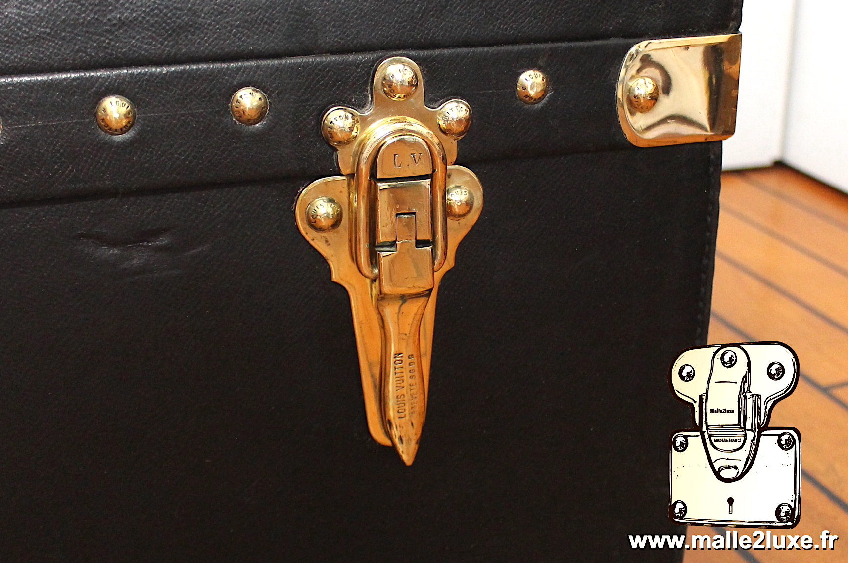 Levier de fermture breveté Louis Vuitton pour malle automobile