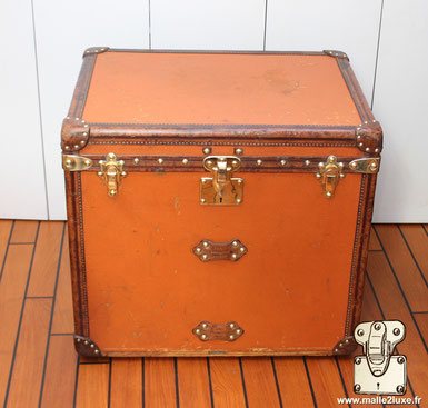 Superbe malle coin cuir et laiton vuittonite orange Louis Vuitton
