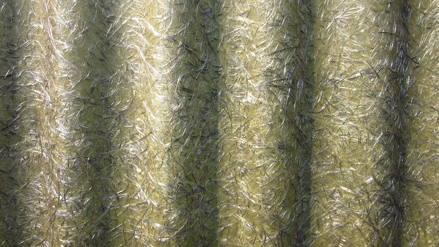 Composiet opgebouwd uit glasvezel gecombineerd met fossiele grondstof gebaseerde matrix (hars)