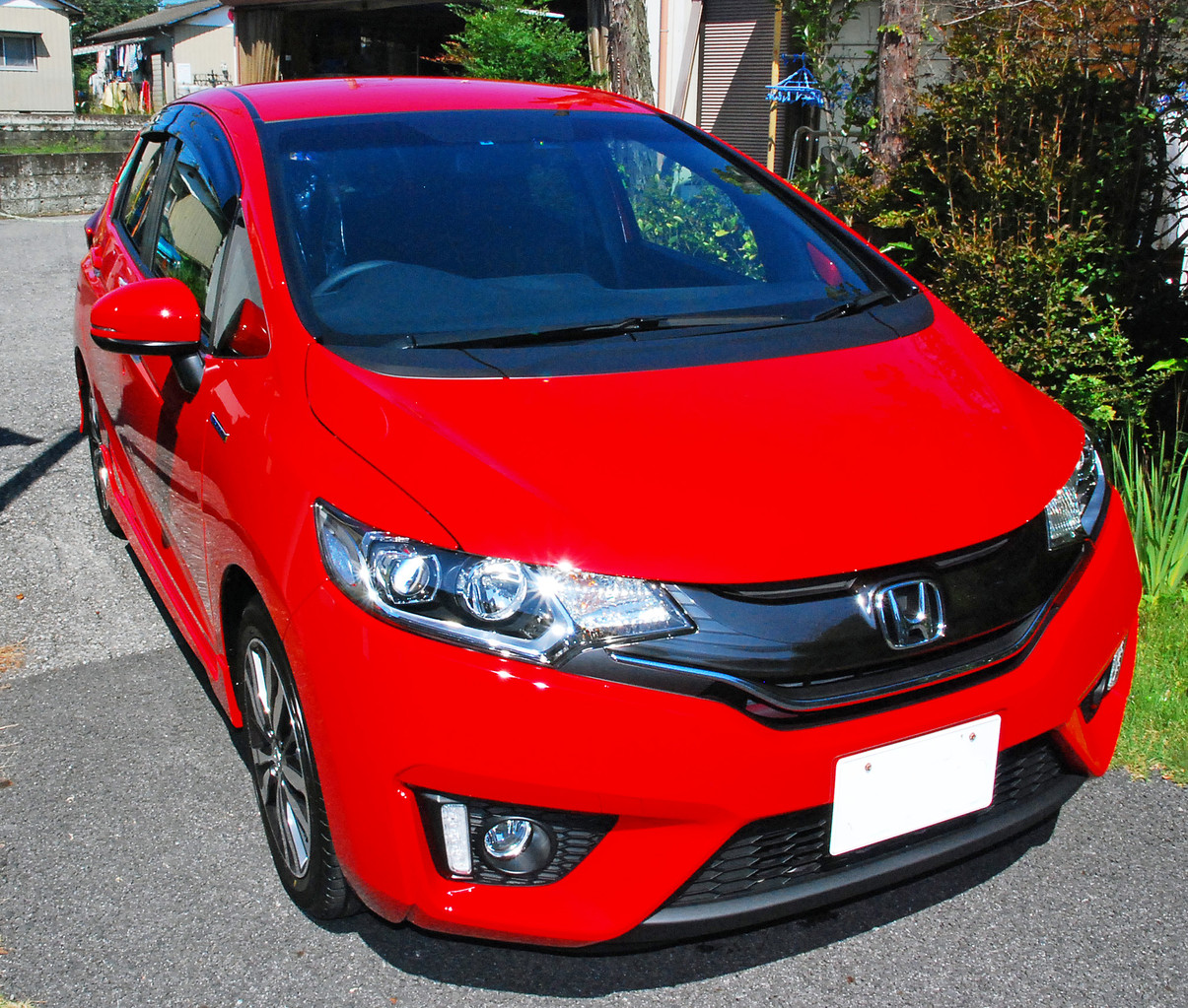 ホンダ フィット3 ハイブリッド Fit Hybrid ミラノレッドの磨き ボディガラスコーティング 飯野自動車コーティング 実績31年 ホンダ フィット3 ハイブリッド Fit Hybrid ミラノレッドの磨き ボディガラスコーティング 飯野自動車コーティング 実績31年