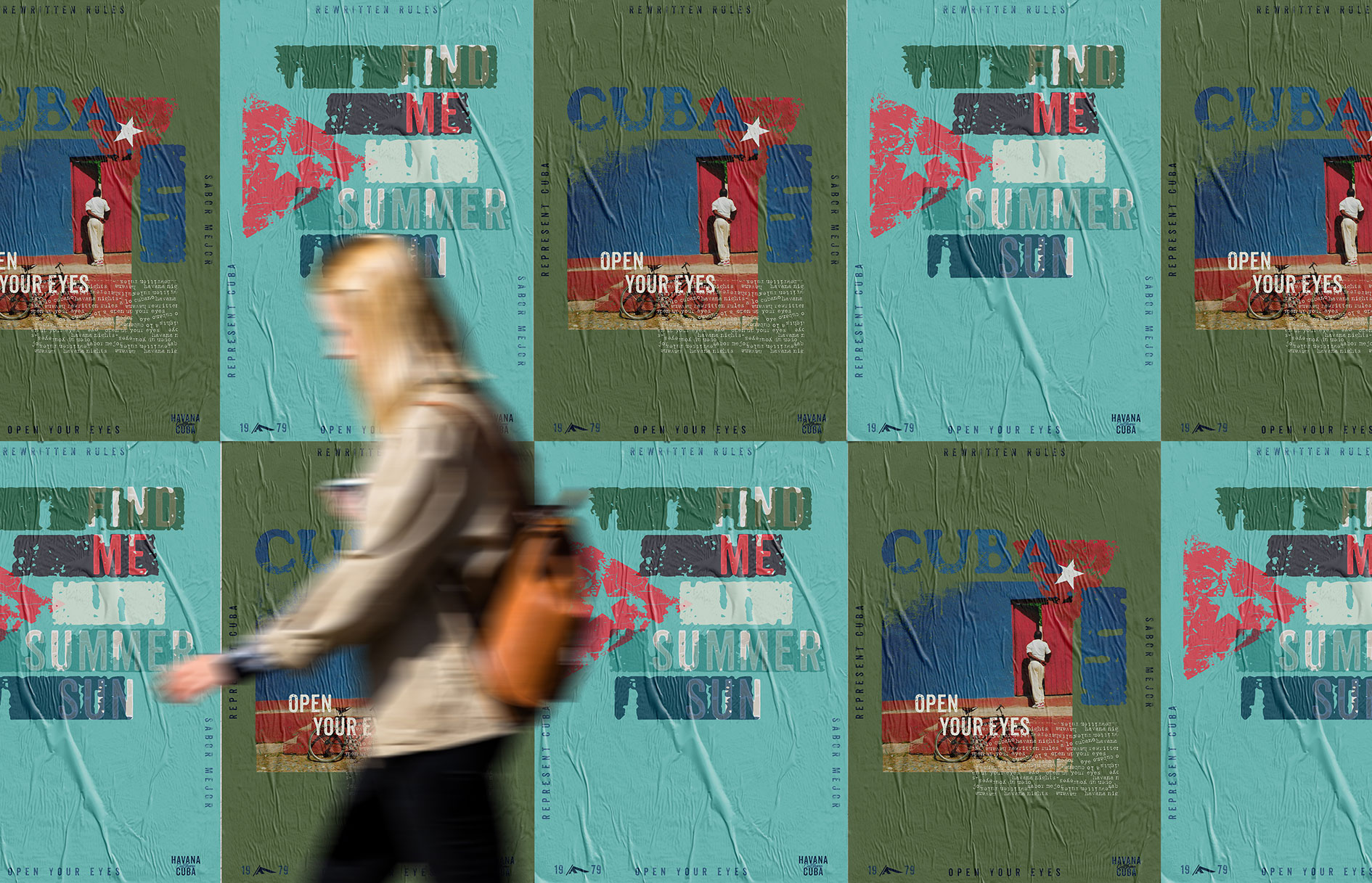 woman walking in front of a poster wall