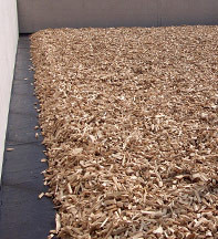 Roth GmbH - Distributor layer of spruce woodchip, grain size 40 - 100, designed as trapezium fill
