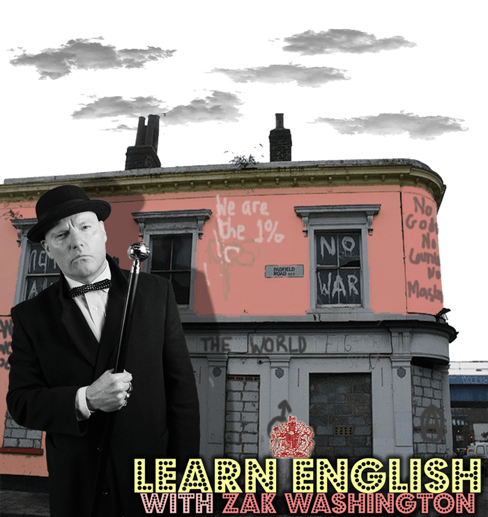 ZakWashington in pork pie hat outside a pink London squatted building