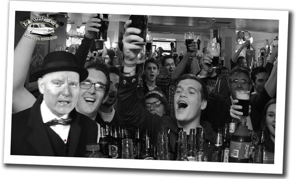 Inside a real pub, a merry crowd singing with Zak and raising glasses
