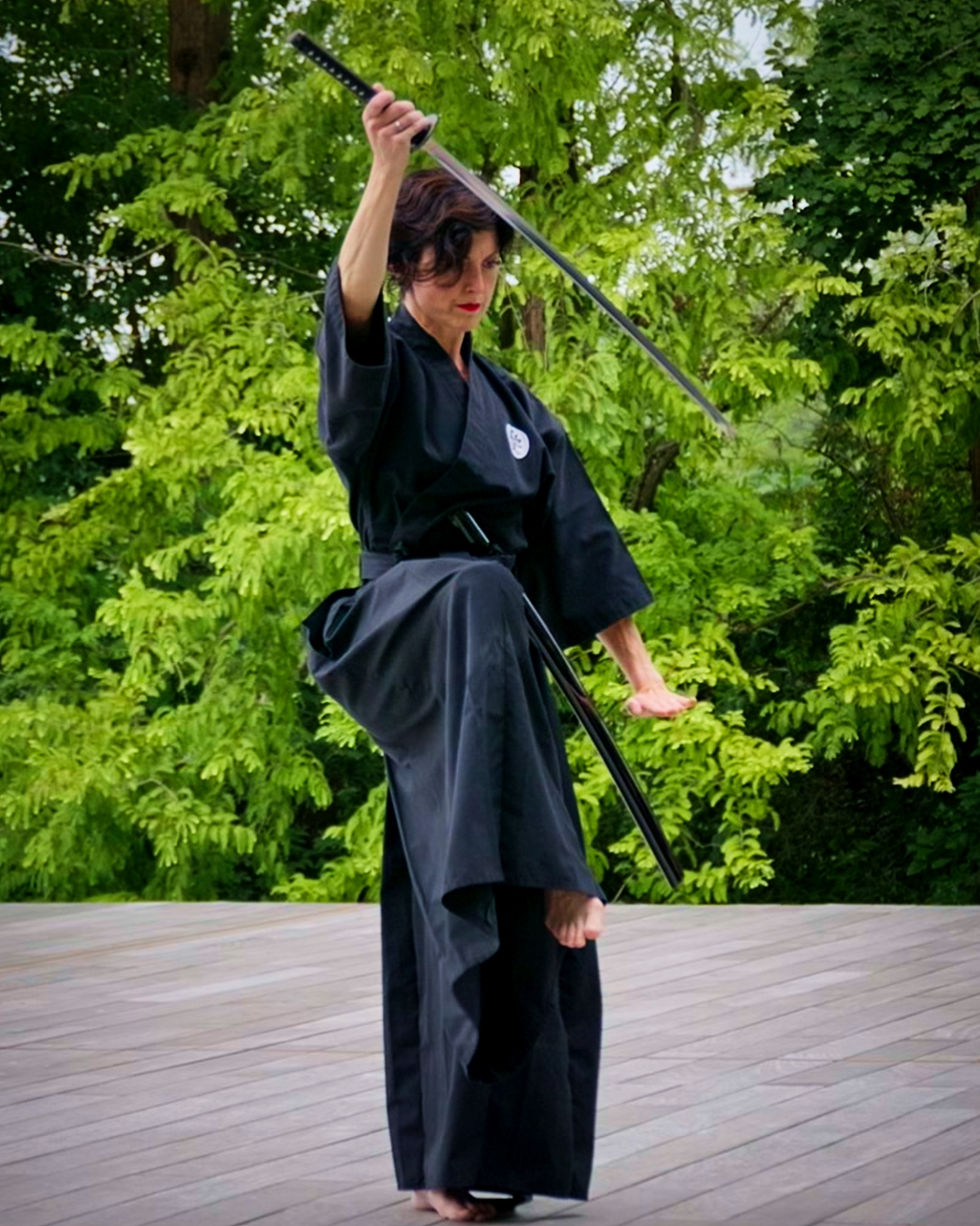 insegnante che mostra un movimento di ai jutsu al dojo di pavia