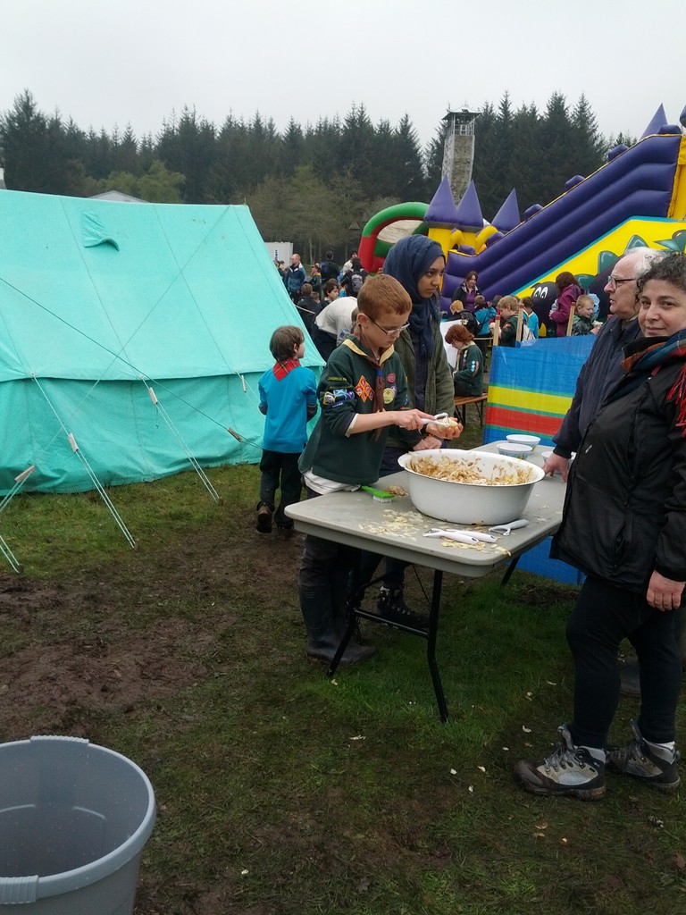 older explores help younger scouts make chips