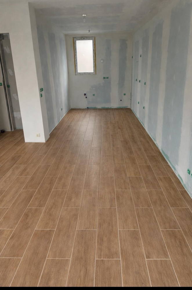 Pose des carreaux conclus .