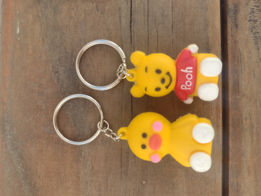Llaveros de muñequitos $350