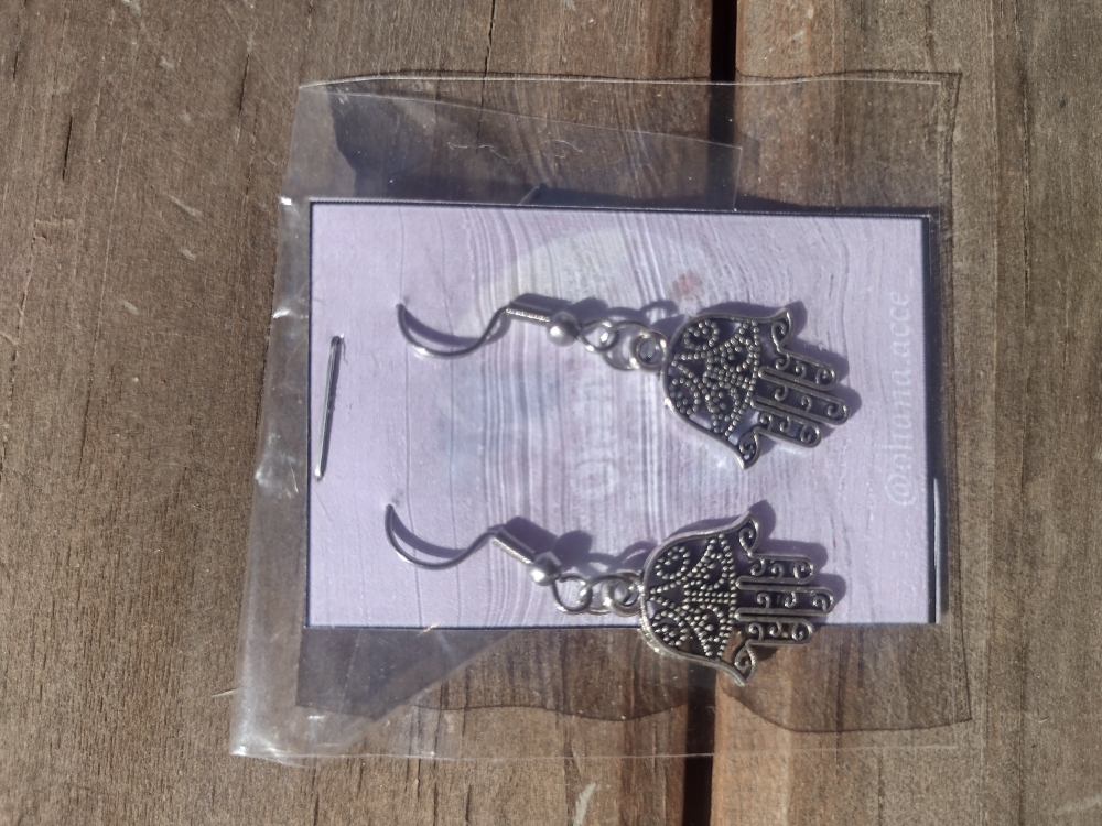 Aros mano de Fátima, acero quirúrgico $300