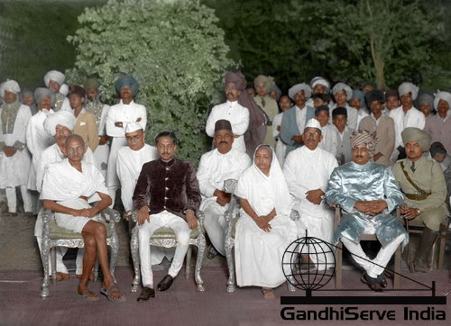 35 - Mahatma Gandhi in the Palace garden of Rajkot Highness Dharmendrasinhji, Rajkot, May 25, 1939. Front row, from left: Gandhi, His Highness Dharmendrasinhji of Rajkot, Kasturba Gandhi , Pradyumbnasinhji (younger brother of HH).