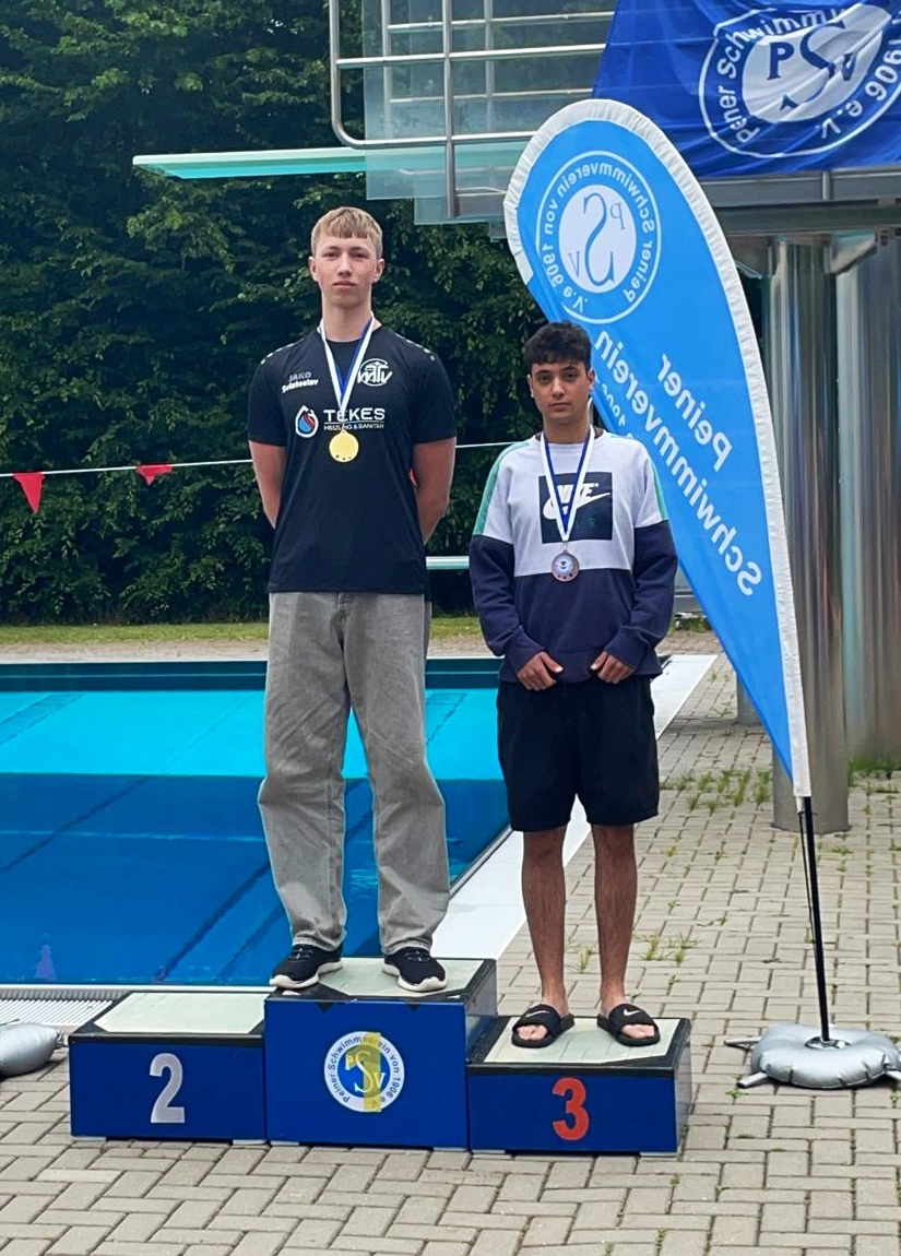 Sviatosla und Egan bei den 50 m Freistil auf dem Treppchen